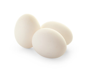 Raw chicken eggs on white background