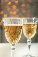 Glasses of champagne on blurred background