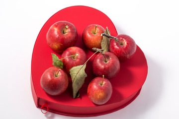 Small apple with red heart box. ranetka