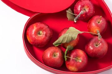 Small apple with red heart box. ranetka