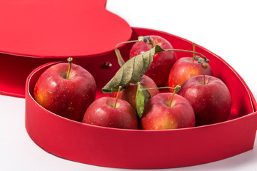 Small apple with red heart box. ranetka