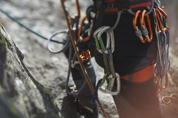 Gordijnen Climbing gear and equipment closeup. Tilt-Shift effect. © esalienko