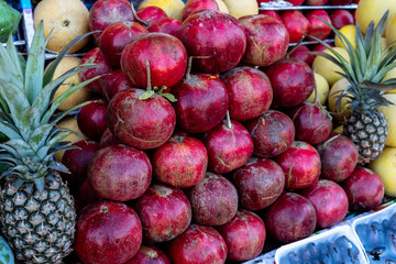 Big assortment of fresh organic fruits. Frame composition of fruits on market