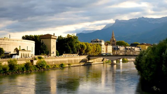 Cinemagraph of Grenoble, in the Alps, France. Water is moving. Filmed in the evening. Cinemagraphs are still photographs in which a minor and repeated movement occurs, forming a video clip.