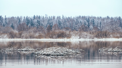 Fototapeta premium Fog and frost on the autumn river.