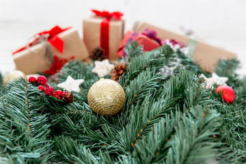 Christmas presents and boxes on wooden background