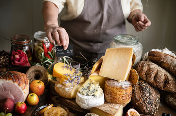 Stacked hard cheese in a beautiful spring setting