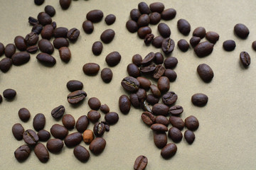 brazilian coffee grains on beige background