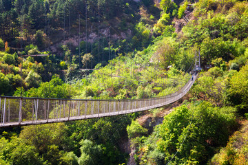 Suspension bridge over the gorge leading to Khndzoresk cave settlement, Syunik region, Armenia
