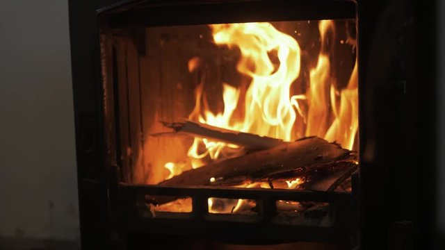 Putting sticks on stove SLOW MOTION