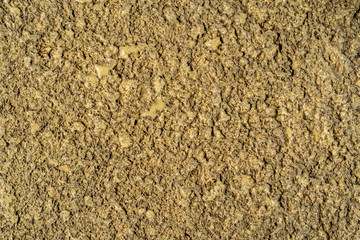 Cracked concrete texture closeup background.