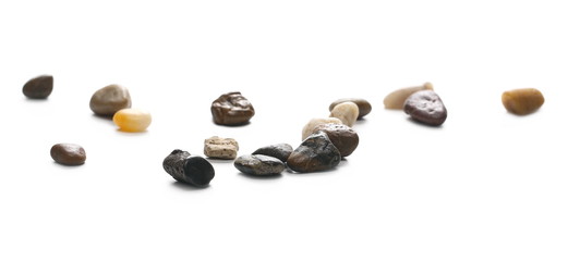 Colorful, decorative pebbles, rocks isolated on white background