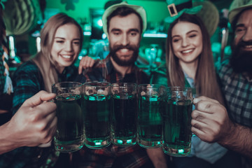 Friends celebrating a Saint Patrick's Day at pub