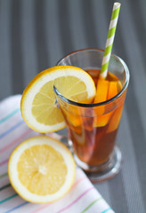 Lemon tea in glass on table