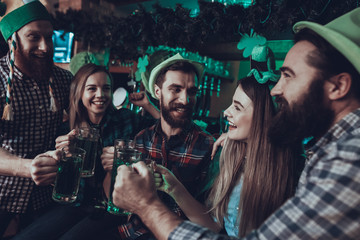 Friends celebrating a Saint Patrick's Day at pub