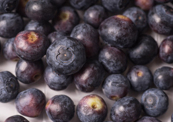 Delicious organic ripe blueberry, full frame and background