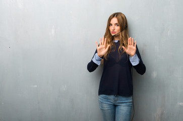 Telemarketer woman making stop gesture with both hands