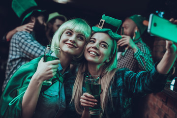 Friends doing selfie at Saint Patrick's Day at pub