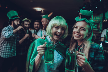 Friends celebrating a Saint Patrick's Day at pub