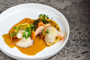 Fine dining Chicken breast with homemade ravioli and vegetables