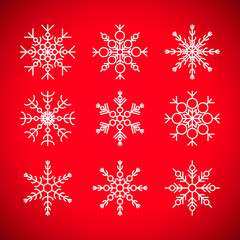 set of snowflakes isolated on red background