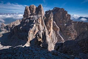Fotobehang Mountaineers equipped face the "Bocchette Alte" ferrata in the Brenta group on the Dolomites, in Italy © serghi8