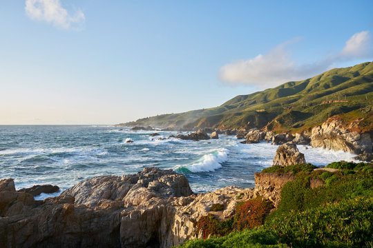 Waves by cliffs in Big Sur, USA