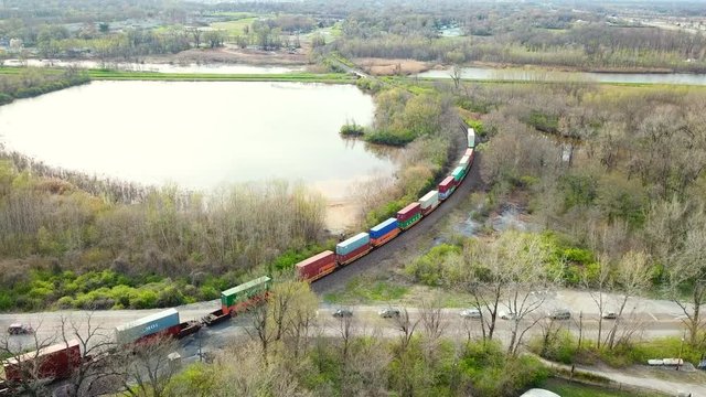 Freight train crossing through traffic