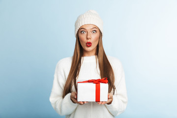 Happy young woman wearing sweater