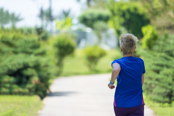 young female runner training for marathon