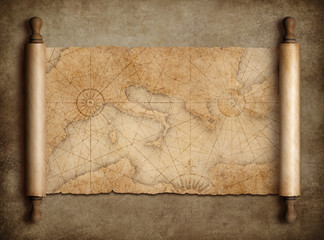 Vintage medieval mediterranean map scroll on table