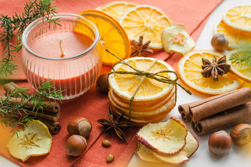 dried oranges, apples, anise stars and cinnamon sticks composition