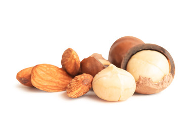 Almond and macadamia nuts isolated on white background.