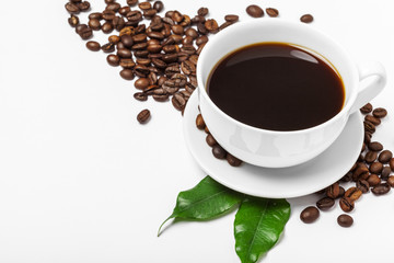 Coffee cup and beans on a white background