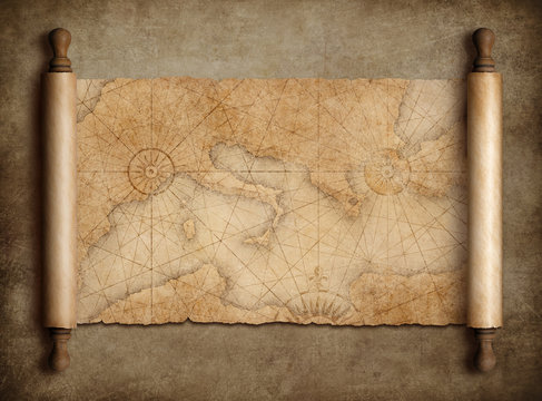 Fototapeta Vintage medieval mediterranean map scroll on table