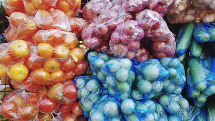 Full Frame Background of Various Kinds of Colorful Vegetable in Plastic Bags