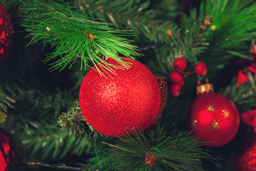 Obraz na płótnie Canvas Decorated Christmas tree closeup.