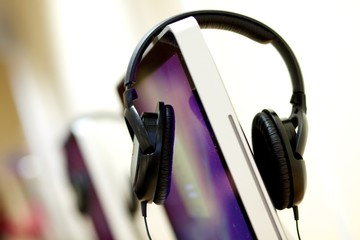 Fototapeta na wymiar Isolated audio head phones on a desktop computer in a University library