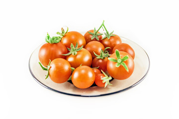 Cherry tomatos on the white background