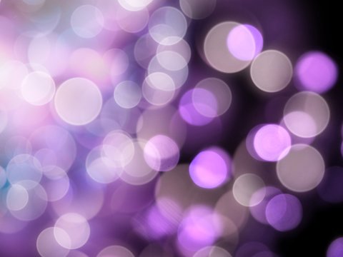 Bright white illumination with glowing white and purple blurred lights on a black background