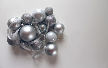 Silver christmas balls on white background