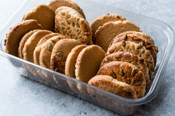 Oatmeal Cookies with Sunflower Seeds in Plastic Container Box / Kernel Seeds for Ketogenic or Keto Diet.