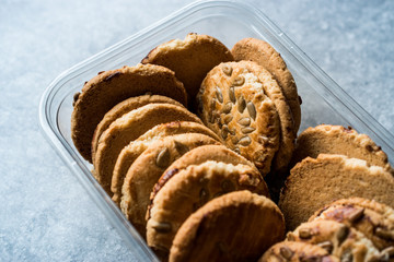 Oatmeal Cookies with Sunflower Seeds in Plastic Container Box / Kernel Seeds for Ketogenic or Keto Diet.