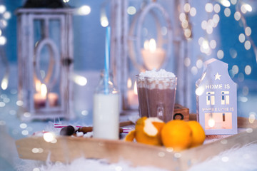 Obraz na płótnie Canvas christmas table with candles and decorations