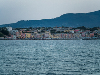 Fototapeta na wymiar Italy, Campania, Gulf of Naples, Naples, Procida Island with colorful houses in the morning and Marina di Sancio Cattolico