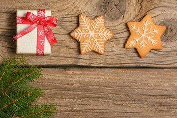 Christmas greeting card with gingerbread cookies and xmas gift box