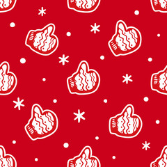 Vector seamless hand drawn mittens and snowflakes pattern. Christmas winter background.