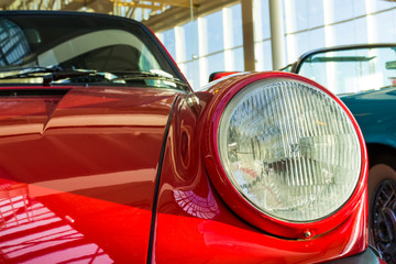 Round headlights of the sports car.