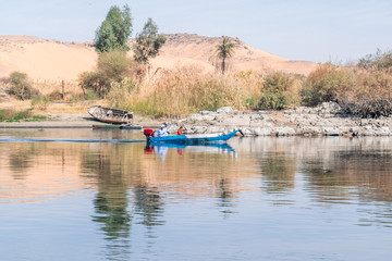 Beautiful scene for Nile river and boats from Luxor and Aswan tour in Egypt