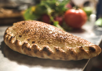 Very Hot Pizza Calzone. Closed pizza